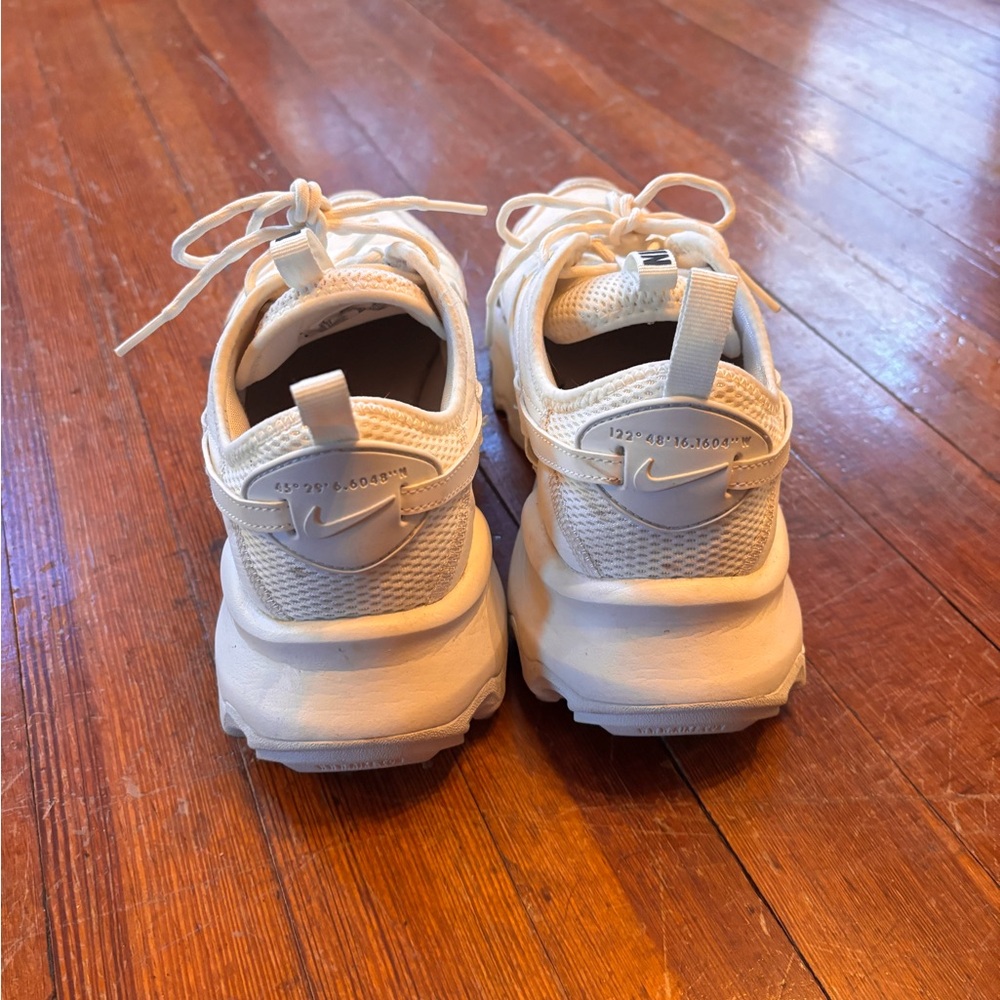 Women’s cream white platform Nike sneakers